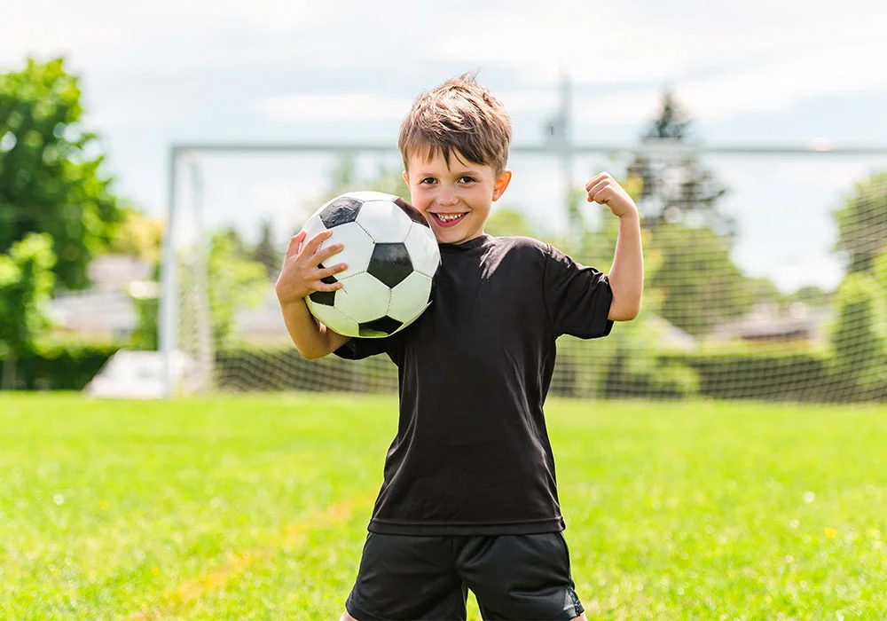 Joueur avec un ballon de football