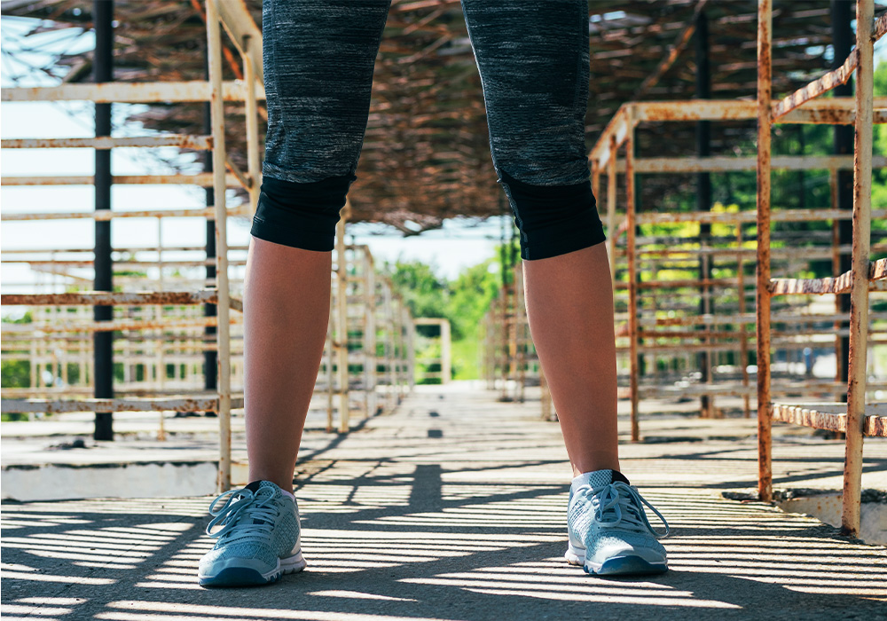 image femme avec legging taille basse qui arrive au mollet